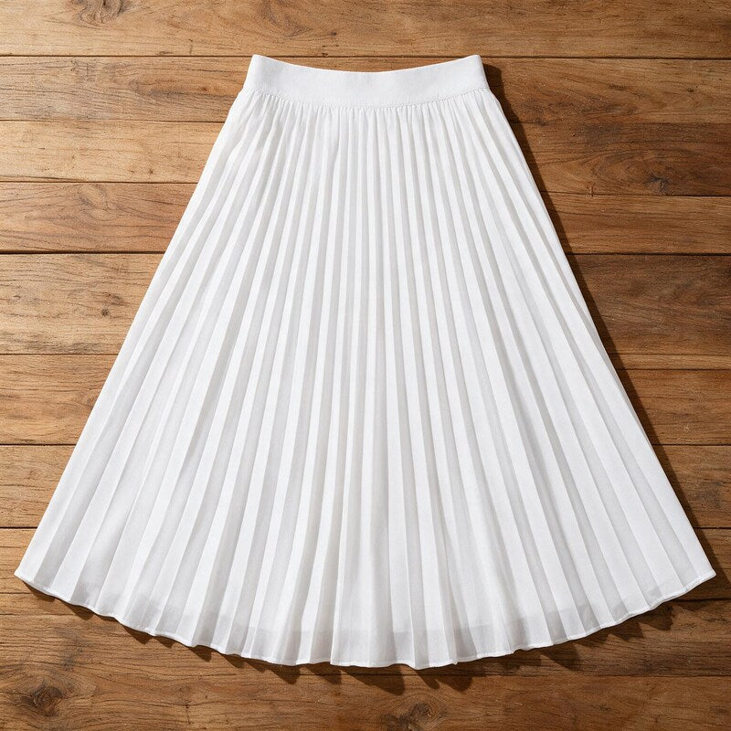 Lucy Melbourne pleated midi skirt in White – flat lay, pleats visible from above